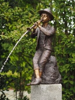Bronzen beeld jongen met fluit AN0603BR-B 1.jpg