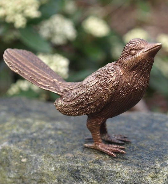 Bronzen beeld vogel opgeheven kopje